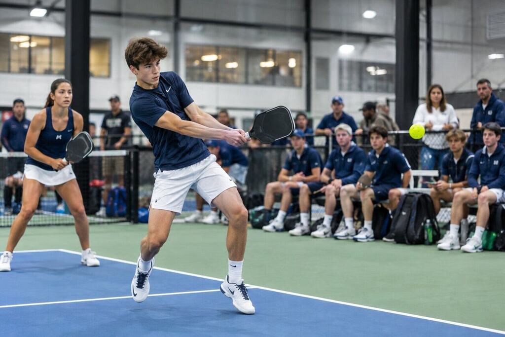 High school pickleball teams competing in a championship match at an indoor pickleball facility in Mesa, Arizona