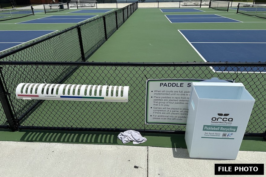 A pickleball court net ready for the next open play session